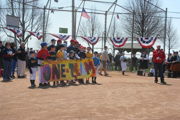 Savin Hill Little League, Martin Richard's team, with its One Team banner. Image via Dot Art (Facebook)